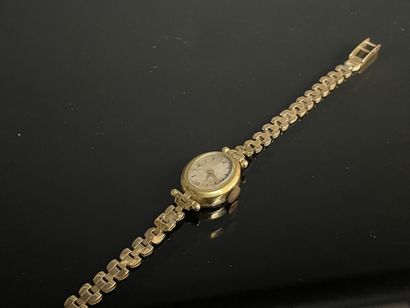 Montre bracelet de dame en or, 
750°/00
L:...