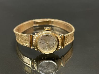 LIP Montre bracelet de dame en or. 750°/00.
Cadran:...