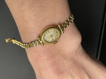Montre bracelet de dame en or, 
750°/00
L:...
