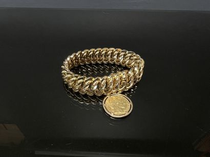 Large bracelet manchette en or, avec pièce...