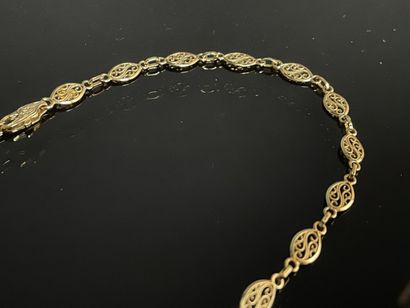 Sautoir en or maille draperie.
Or 750°/00
L:...
