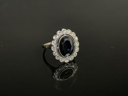 Bague marguerite en or jaune et or gris,...