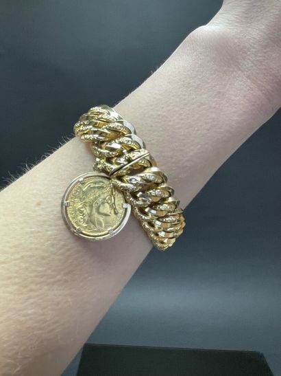 Large bracelet manchette en or, avec pièce...