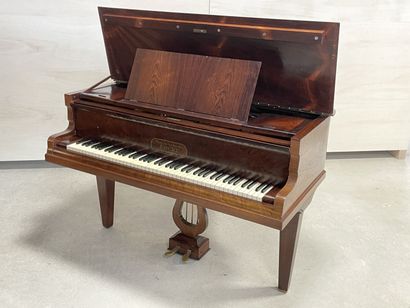 FOCKÉ Piano crapaud en placage de palissandre....