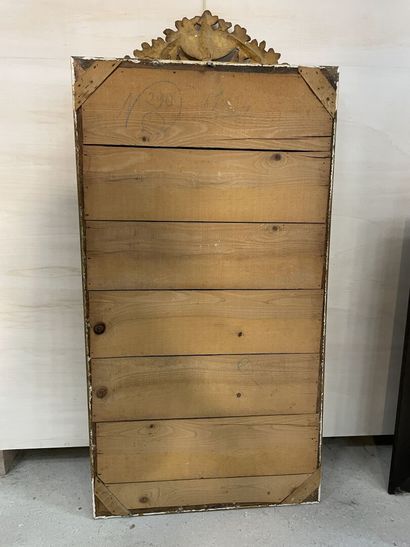 Trumeau en bois et stuc patine doré.
Bord...