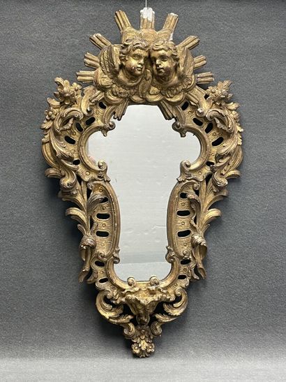 Violin mirror, wood and gilded stucco frame,...