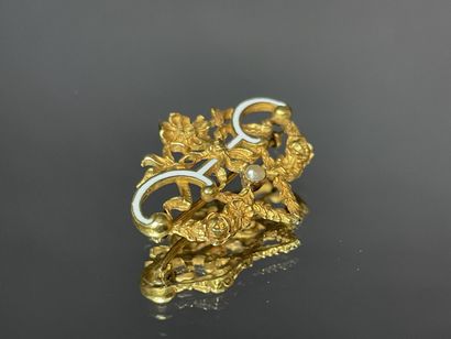 Broche en or et émail, vers1900.
Or 750°/00
L:...