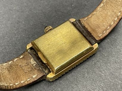 JAEGER Montre de dame en or, soulignée de...