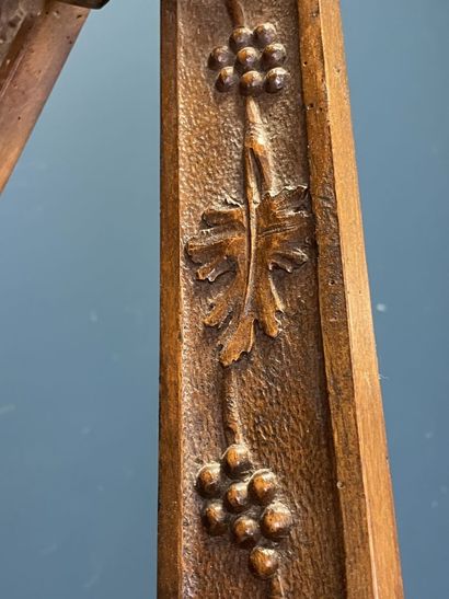 Large folding tripod easel in carved mahogany....