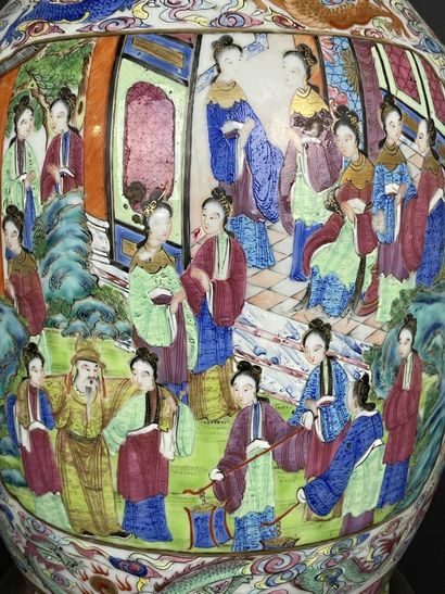 Pair of polychrome porcelain vases, richly...