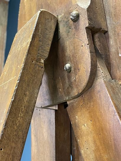 Large folding tripod easel in carved mahogany....
