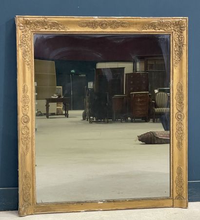 Wood and gilded stucco mirror, decorated...