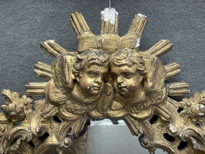 Violin mirror, wood and gilded stucco frame,...