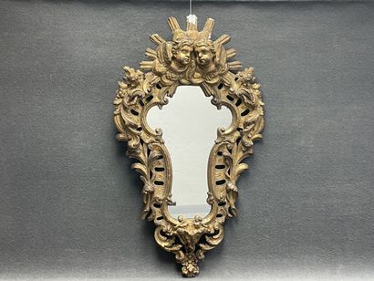Violin mirror, wood and gilded stucco frame,...