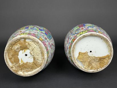 Pair of polychrome porcelain vases, richly...