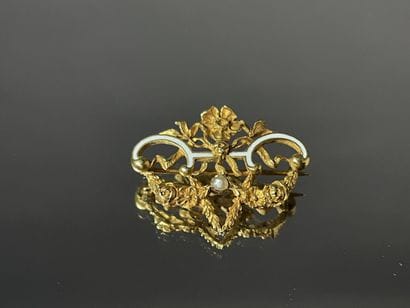 Broche en or et émail, vers1900.
Or 750°/00
L:...