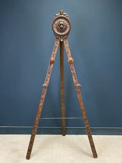 Large folding tripod easel in carved mahogany....