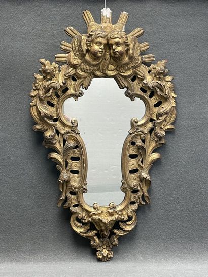 Violin mirror, wood and gilded stucco frame,...