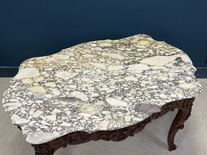 Middle table in richly carved patinated oak
Marble...