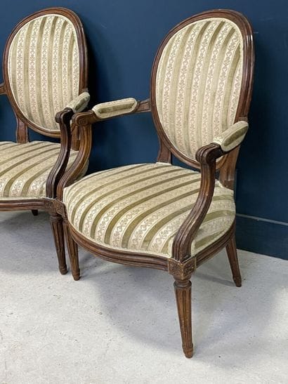 Suite of four armchairs, medallion back....