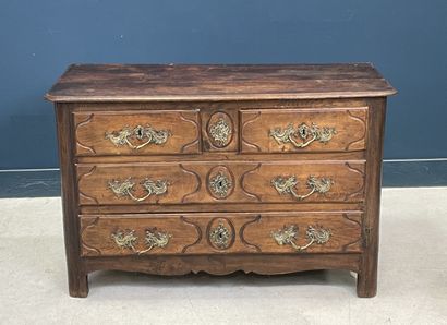 Moulded oak chest of drawers opening to four...