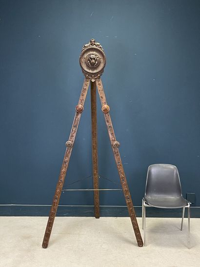 Large folding tripod easel in carved mahogany....