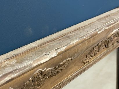 Wood and gilded stucco mirror, decorated...