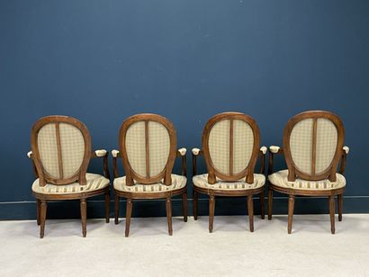 Suite of four armchairs, medallion back....