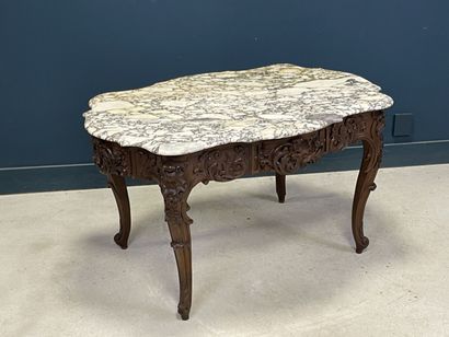 Middle table in richly carved patinated oak
Marble...