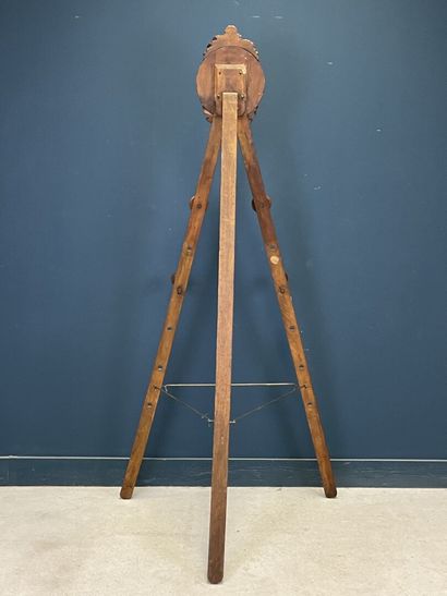 Large folding tripod easel in carved mahogany....