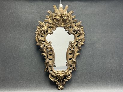 Violin mirror, wood and gilded stucco frame,...