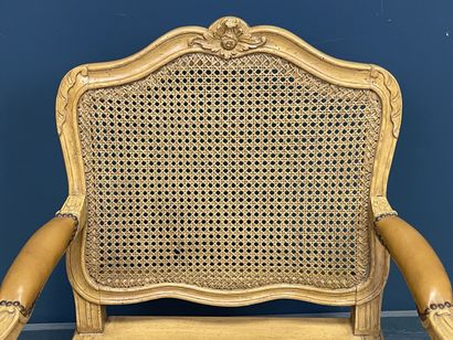 Carved and patinated beechwood armchair with...