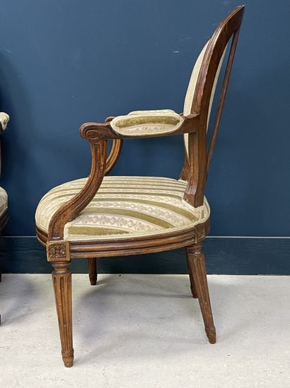 Suite of four armchairs, medallion back....