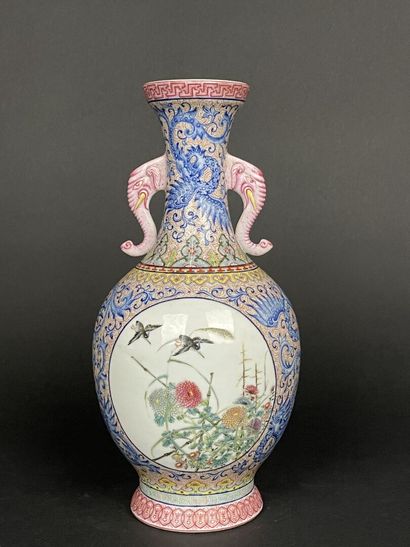 Porcelain vase with pink family polychrome...