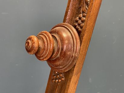 Large folding tripod easel in carved mahogany....