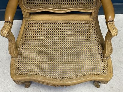 Carved and patinated beechwood armchair with...