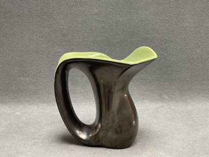 Vase en céramique jaune et noir. 
H. :20...