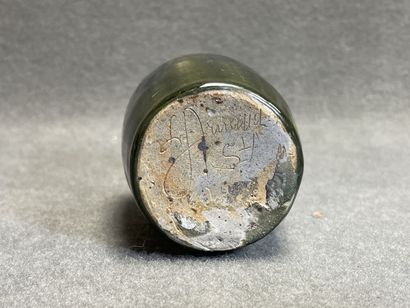 Quatre vases et un pichet en céramique émaillée....