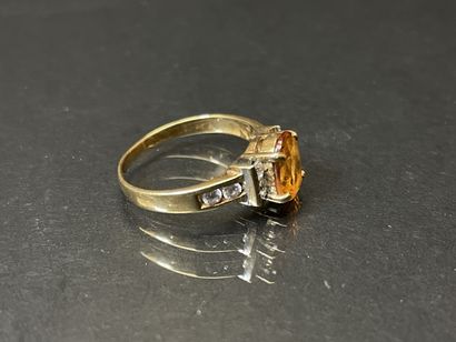 Bague en or 585°/00 sertie de topaze orange,...