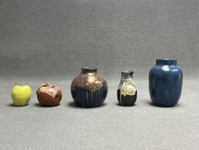 Léon POINTU (1879-1942):
Trois vases et une...