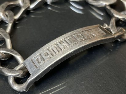 Gourmette en argent marquée CATHERINE.
L:...