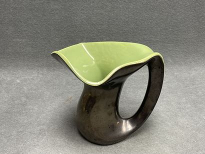 Vase en céramique jaune et noir. 
H. :20...