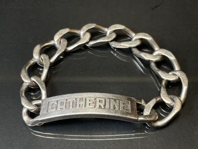 Gourmette en argent marquée CATHERINE.
L:...