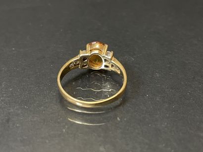 Bague en or 585°/00 sertie de topaze orange,...