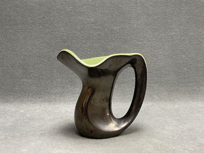 Vase en céramique jaune et noir. 
H. :20...