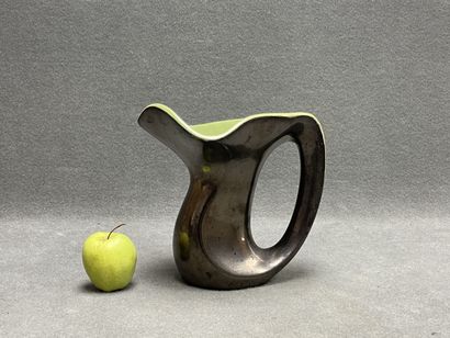 Vase en céramique jaune et noir. 
H. :20...