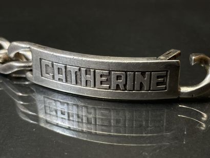 Gourmette en argent marquée CATHERINE.
L:...