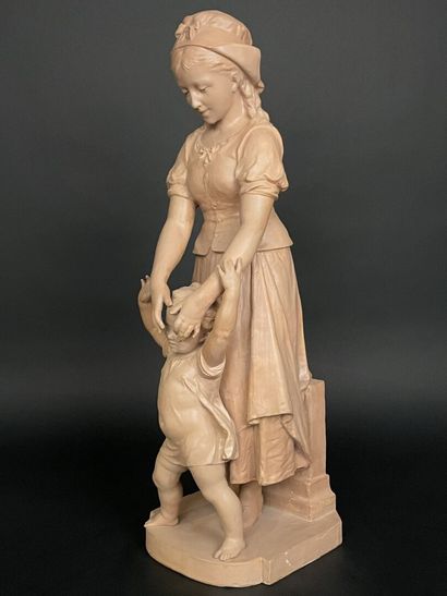 Jeune fille et enfant.
Grande épreuve en...