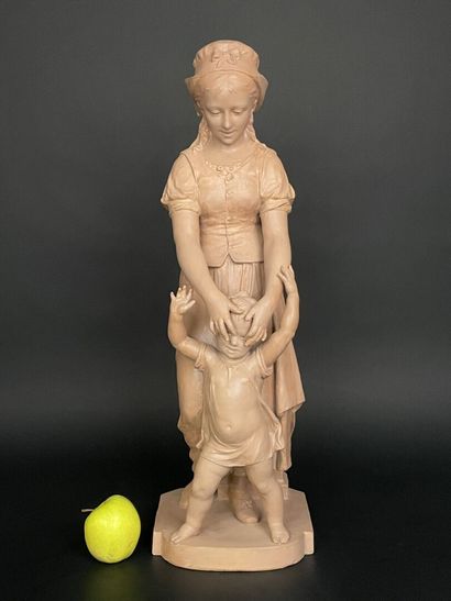 Jeune fille et enfant.
Grande épreuve en...