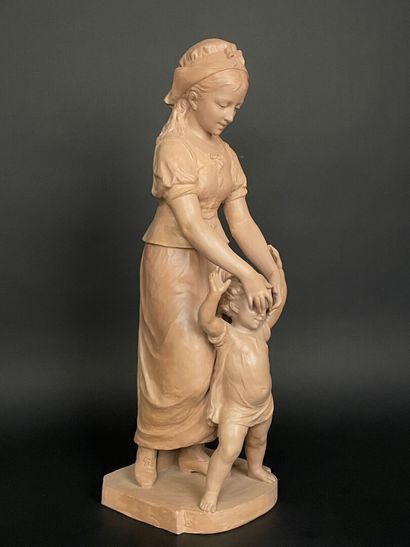 Jeune fille et enfant.
Grande épreuve en...